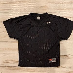 Black Nike practice jersey. Nike boys. XS. New without tags.